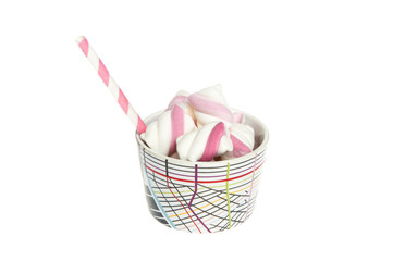 Marshmallow in a cup on white background