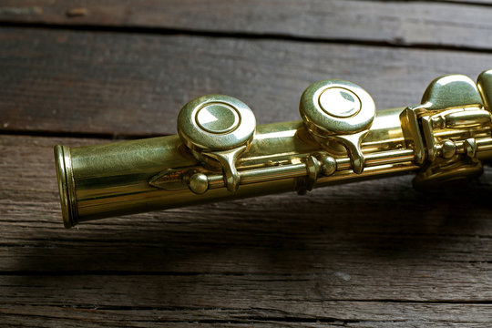 Flute on wooden background