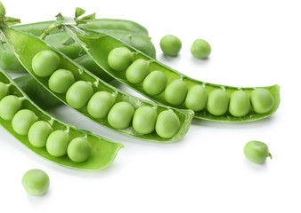 Fresh green peas isolated on white