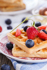 Waffles with strawberries and blueberries  for Breakfast,Belgian.selective focus