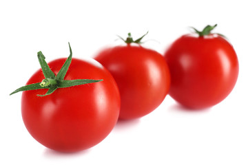 Cherry tomatoes isolated on white