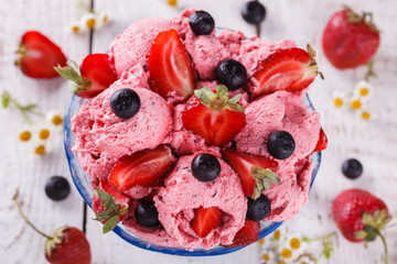 Strawberry ice cream balls with fresh berries.selective focus