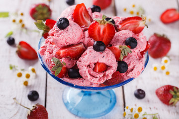 Strawberry ice cream balls with fresh berries.selective focus