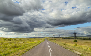 clouds over the road.