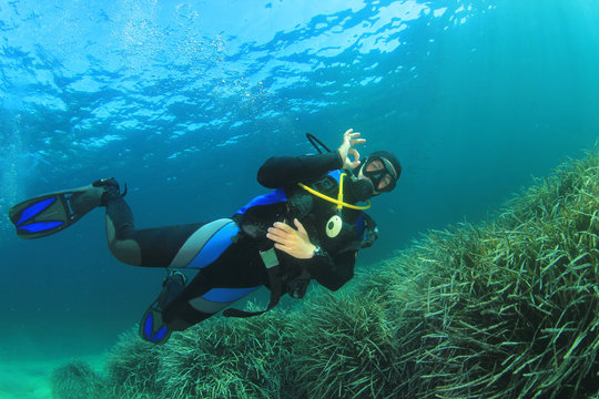 Scuba diver diving underwater