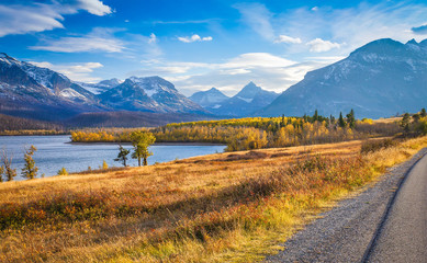 Naklejka premium autumn view of Going to the Sun Road in Glacier National Park, Montana, United States