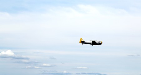 great plane flies into the sky and makes daring stunts