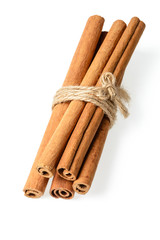 bundle of cinnamon sticks on white. (large depth of field, taken with tilt shift lens)