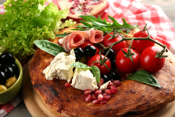 Ingredients of Mediterranean cuisine, on wooden board, close-up