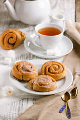 cup of tea and cinnamon buns