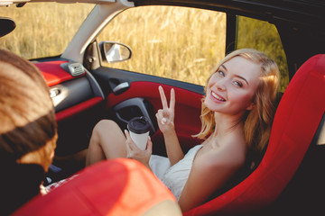 Pretty girlfriend and boyfriend are traveling by transport