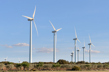 wind turbines against the blue sky