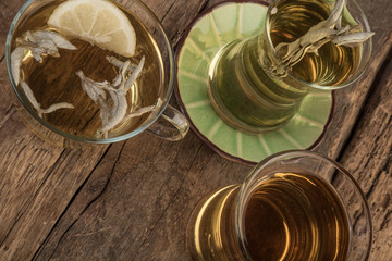 sage tea on wooden table