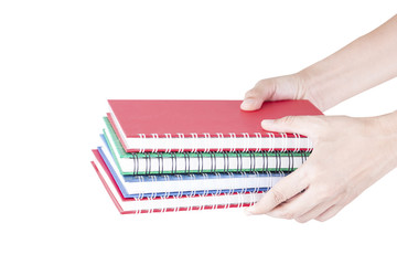 stack of notebooks colorful in hand.
