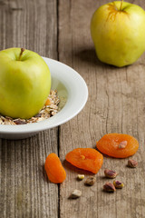 Breakfast with muesli and apples