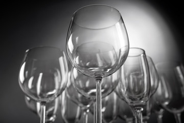 Empty wine glasses on gray background
