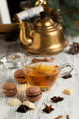 Chocolate macaroons and cup of tea