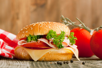 Fresh sandwich with ham and tomato