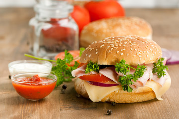 Fresh sandwich with ham and tomato