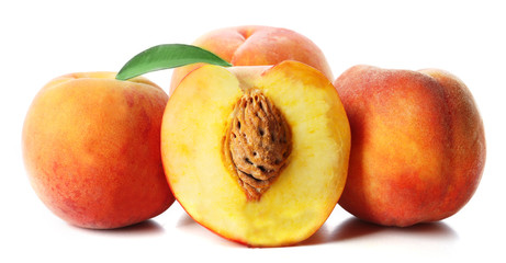 Fresh peaches isolated on white