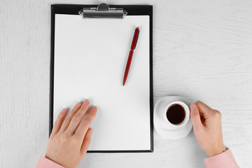 Hands working in the office with documents  on white table