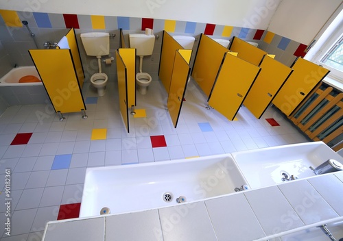 Small Toilets And Sinks In The Bathroom Of The Kindergarten