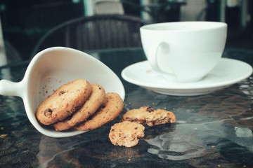 Hot coffee with chocolate cookies