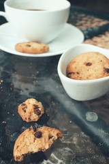 Hot coffee with chocolate cookies