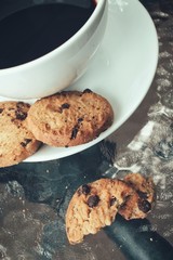 Hot coffee with chocolate cookies