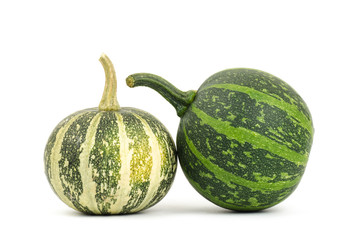 Raw pumpkins on white background