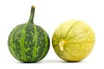 Raw pumpkins on white background