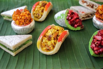 Indian sweets on banana leaf