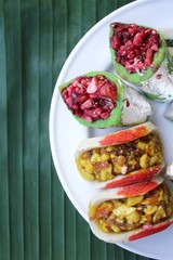 Indian sweets on banana leaf