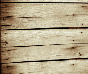 Boards with rusty nails in a row