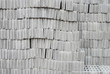 Cement block in a factory, rough textured heap