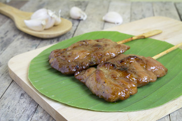 pork grilled stick on banana leaf