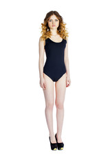 Fototapeta premium Model Tests, Young slim woman posing in black leotard