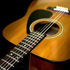 Fototapeta premium Detail of acoustic guitar with retro filter effect