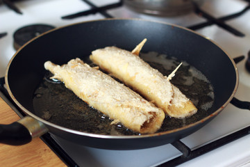 Fried pancakes on a frying pan