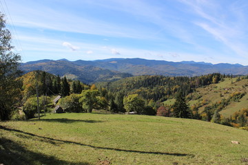 Obraz premium view of the picturesque mountains peaks in early autumn