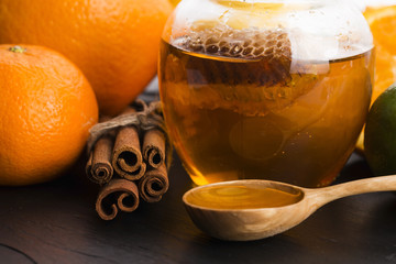honey with citrus fruit and cinnamon