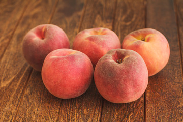 Fototapeta na wymiar Group of ripe red peaches