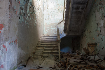 Fototapeta na wymiar Steps in the destroyed building
