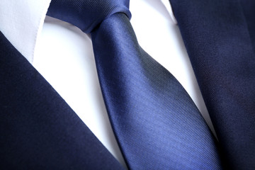 Male jacket with shirt and tie close up