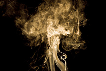 Movement of white smoke on black background