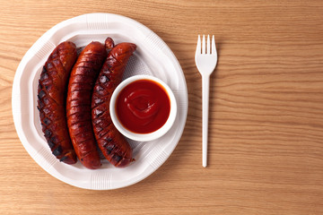 Food. Delicious, grilled sausages on the table