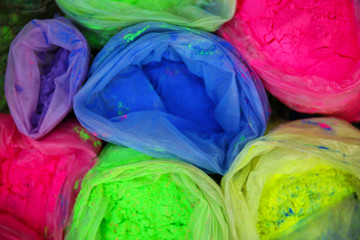 Bags with Indian dyes on Holi color festival