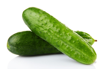 Ripe cucumbers isolated on white