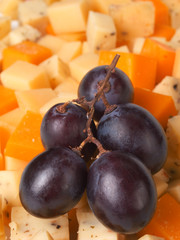 Cheese with grapes