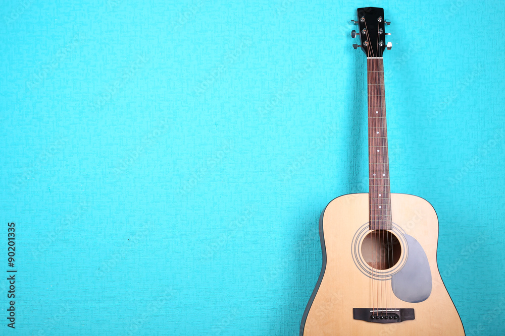 Wall mural Classical guitar on blue wallpaper background